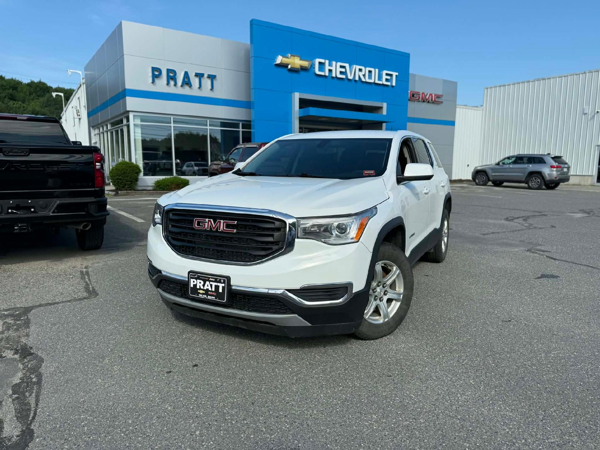 2019 GMC Acadia SLE-1 in Summit White — front three-quarter view